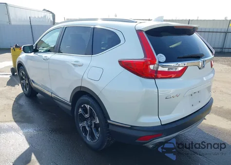 2017 Honda Cr-V Touring z USA, uszkodzony, nr VIN 2HKRW1H9XHH515567